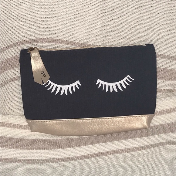 ipsy Handbags - Makeup bag with eyelash design